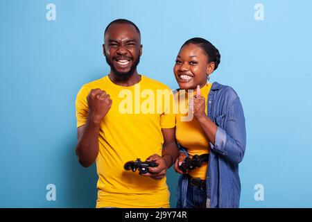 African American Boyfriend Winning Video Game Girlfriend Stock Photo by  ©EdZbarzhyvetsky 181571646