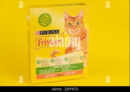 Purina Friskies cat food. Cardboard box with dry pelleted pet food