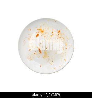 White ceramiс empty plate with food leftover, red sauce Stock Photo
