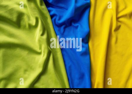 Three polyester, nylon folded sport shirts, top view Stock Photo