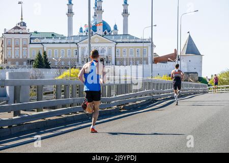 Kazan, Russia - May 17, 2022: athletes runners run near Kazan Kremlin during Kazan Marathon Stock Photo