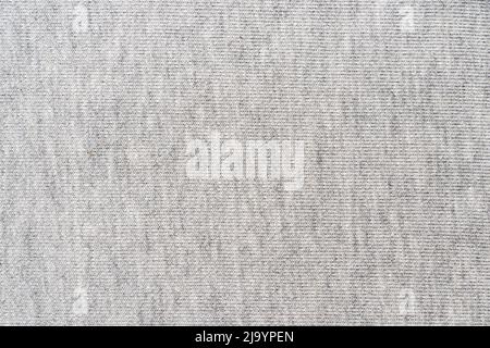 Large gray fabric texture or background, knitted cotton cloth, top view Stock Photo