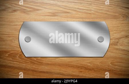Blank iron metal plate on wooden background, space for text Stock Photo