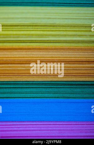 Abstract of a pile of colored pieces of paper Stock Photo