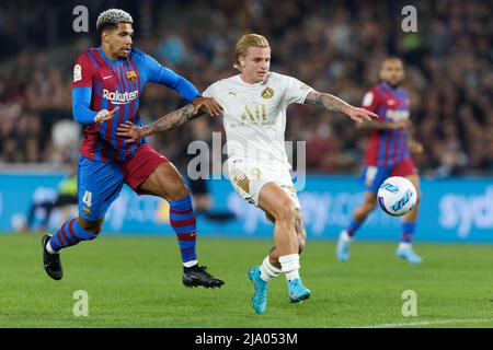 Sydney, Australia. 25th May, 2022. Jason Cummings of the All Stars is challenged by Ronald Araujo of FC Barcelona during the match between FC Barcelona and the A-League All Stars at Accor Stadium on May 25, 2022 in Sydney, Australia Credit: IOIO IMAGES/Alamy Live News Stock Photo