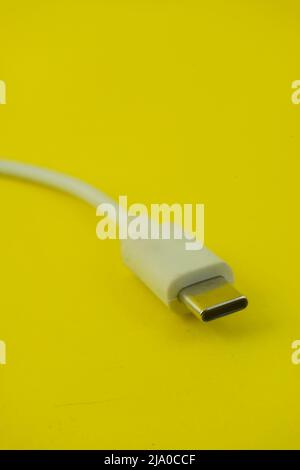 USB type-C connector cable. Realistic Cables USB HDMI Type C Lightning Mini. A white USB type C charger cable, compatible for many devices. Stock Photo