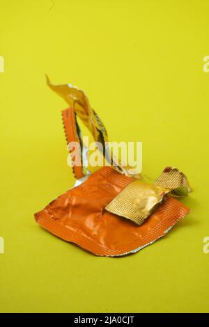 medicine plastic waste plain yellow background isolated. laboratory chemical and medical waste. Plastic waste and ecology Stock Photo