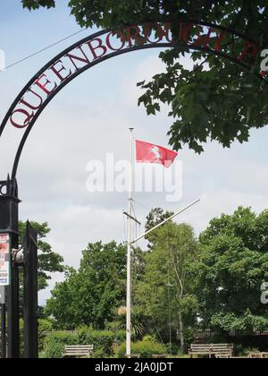 Queenborough, Kent, UK. 26th Apr, 2022. The town of Queenborough in Kent seen proudly flying the 'Kent Day' flag from its flag mast. The ‘Kingdom of Kent’ was established in 455. The Kent flag featuring the white horse is called Invicta after Kent's motto which means 'undefeated'. Credit: James Bell/Alamy Live News Stock Photo