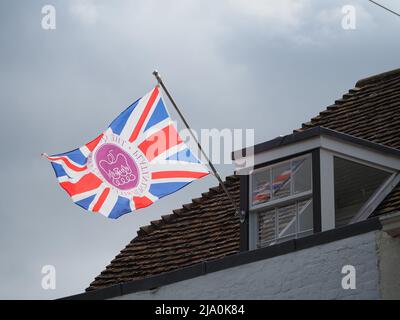 Queenborough, Kent, UK. 26th Apr, 2022. A shopfront in Queenborough decorated for the Queen's Platinum Jubilee Weekend. Credit: James Bell/Alamy Live News Stock Photo