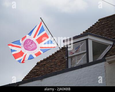 Queenborough, Kent, UK. 26th Apr, 2022. A shopfront in Queenborough decorated for the Queen's Platinum Jubilee Weekend. Credit: James Bell/Alamy Live News Stock Photo