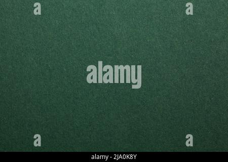Green designed grunge texture. Vintage background with space for text or image. Stock Photo
