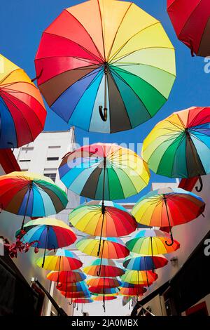 A colorful umbrella artistic installation inside the Solar de French Gallery in San Telmo, Buenos Aires, Argentina. Stock Photo