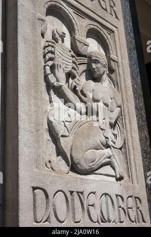 The Salmon Tower entrance at 11 West 42nd Street is limestone with 12 signs of the Zodiac, Midtown Manhattan, New York City, USA  2022 Stock Photo