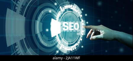 SEO Search Engine Optimization. Man finger touching SEO Hologram. Digital online marketing, Digital marketing media, and Internet technology Concept. Stock Photo