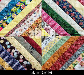 Close up of a colorful old-fashioned quilted print pattern Stock Photo