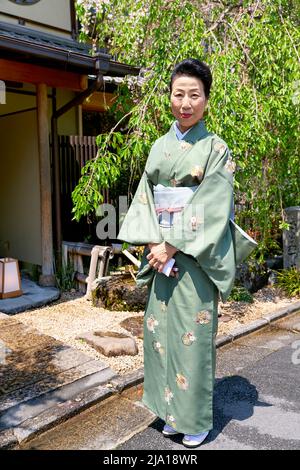 Japan. Kyoto. Senior woman wearing traditional kimono Stock Photo