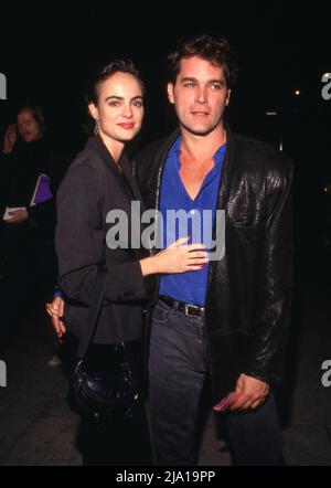 **FILE PHOTO** Ray Liotta Has Passed Away. Michelle Johnson and Ray Liotta Circa 1991 Credit: Ralph Dominguez/MediaPunch Stock Photo