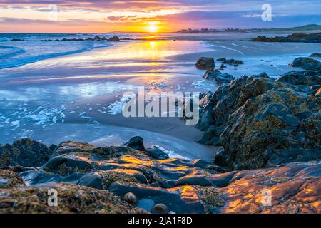 The sunset at Rhosneigr on Anglesey, Wales Stock Photo