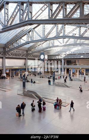 Moynihan Train Hall, an expansion of Penn Station in the former James A. Farley Post Office Building, has access to the Long Island Railroad & Amtrak. Stock Photo