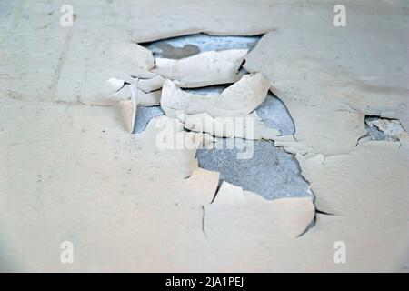 wall paint damage due to moisture in close up Stock Photo