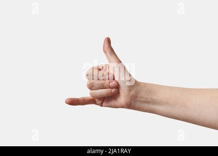 Female hand sign language Y sign on white. Stock Photo