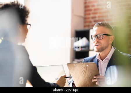 Job Interview. Business Manager Talking To Recruiter In Meeting Stock Photo