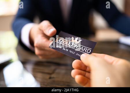 Loyalty Program Reward And Point Card. Customer Man Shopping Stock Photo