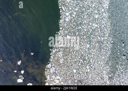 Patterns formed by sea ice from above Stock Photo