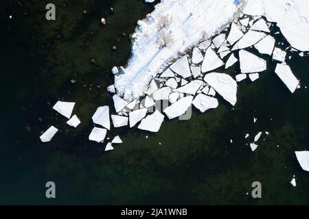 Patterns formed by sea ice from above Stock Photo