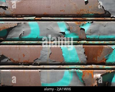grey brown green rusted metal rolling shutter texture useful as a background Stock Photo
