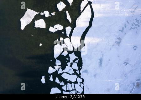 Patterns formed by sea ice from above Stock Photo