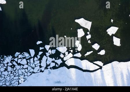 Patterns formed by sea ice from above Stock Photo