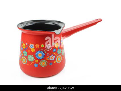 Typical turkish coffee pot isolated on white background. Red metallic souvenir Stock Photo
