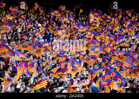 BARCELONA - APR 22: Fans waving flags during the UEFA Women's Champions League match between FC Barcelona and VfL Wolfsburg at the Camp Nou Stadium on Stock Photo