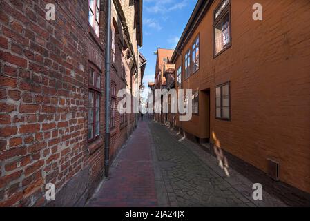 Historic old town houses in a cobbled alley, Lueneburg, Lower Saxony, Germany Stock Photo