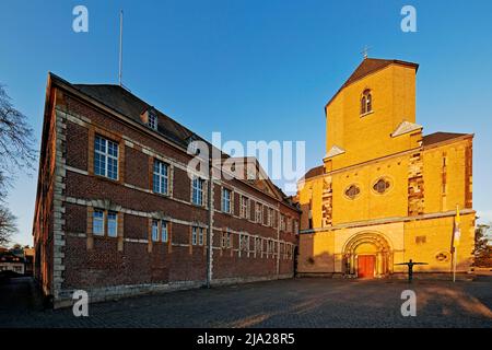 West tower of St. Vitus Minster on the Abteiberg in the evening light, Moenchengladbach, Lower Rhine, North Rhine-Westphalia, Germany Stock Photo