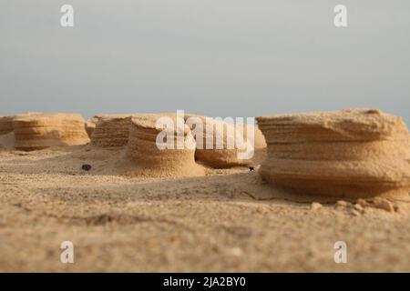 Natural wind and sand sculptures in baltic sea and gulf of riga in Latvia. Sky and sea on the background Stock Photo