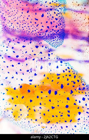 Oil bubbles inside water base form patterns Stock Photo