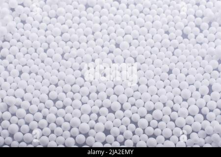 White little polystyrene foam balls as background Stock Photo