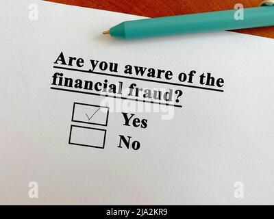 One person is answering question about scam and fraud. He is aware of the financial fraud. Stock Photo