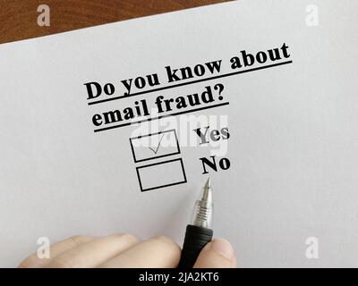 One person is answering question about scam and fraud. He knows about email fraud. Stock Photo