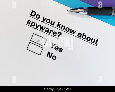 One person is answering question about scam and fraud. He knows about spyware. Stock Photo