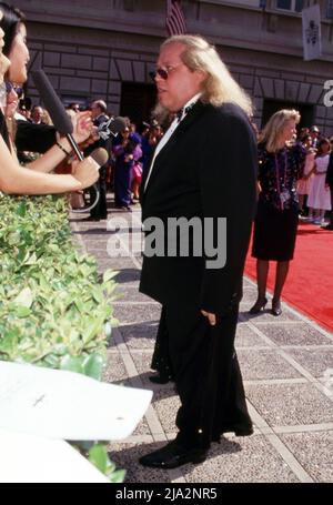 Sam Kinison at the 43rd Annual Primetime Emmy Awards on August 25, 1991 at the Pasadena Civic Auditorium in Pasadena, California. Credit: Ralph Dominguez/MediaPunch Stock Photo