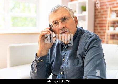 Senior Old Man Talking On Smart Phone Stock Photo