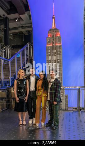New York, USA. 26th May, 2022. New York, NY - May 26, 2022: Cara Buono, Noah Schnapp, Priah Ferguson, Gaten Matarazzo from Stranger Things attends ceremonial lighting of Empire State Building ahead of global event for season 4 premiere Credit: Sipa USA/Alamy Live News Stock Photo