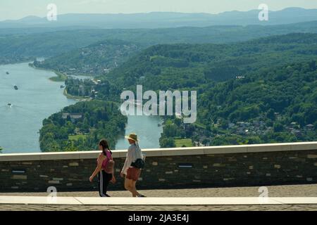 Königswinter, Germany- May 18, 2022 : Tourists enjoying the panoramic view of the river Rhine from the famous Drachenfels in Königswinter Germany Stock Photo