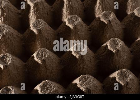 Abstract background. frame geometry. Egg packaging. Paper tray for domestic eggs. Beige and grey. Minimalism. Paper packaging egg carton Stock Photo