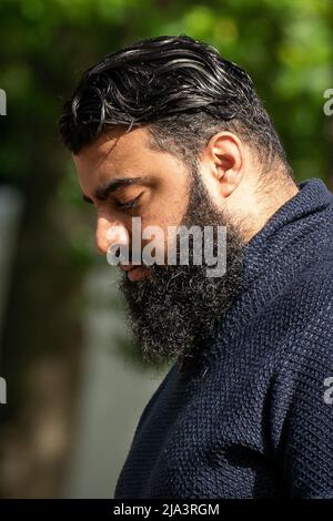 Muhammed Geyas Ilyas, 29, arrives for a plea hearing at Isleworth Crown Court in London, as he was allegedly part of a network of couriers who removed an estimated £110 million in criminal cash from the UK to Dubai in 2020. He admitted one count of removing an undefined sum of criminal cash from the UK. He will be sentenced at Isleworth Crown Court at a later date, to be fixed.Picture date: Friday May 27, 2022. Stock Photo