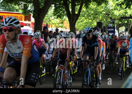 Maldon, UK. 27th May 2022. Stage one of the RideLondon Classique 2022 women's cycle race, part of the UCI Women’s World Tour calendar. The race starts in the Promenade Park, Maldon before making its way around north Essex and finishing back in Maldon. The riders grouped together at the start of the race. Credit: Eastern Views/Alamy Live News. Stock Photo