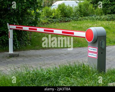 Barrier in private parking. Barrier for cars. Stock Photo